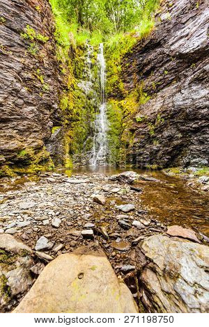 Little Waterfall In Green Summer Mountains, Norway.