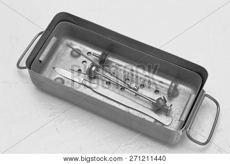 Retro. Rare Medical Sterilizer With Metal Surgical Scalpel, Reusable Glass Syringe, Steel Spinal Nee