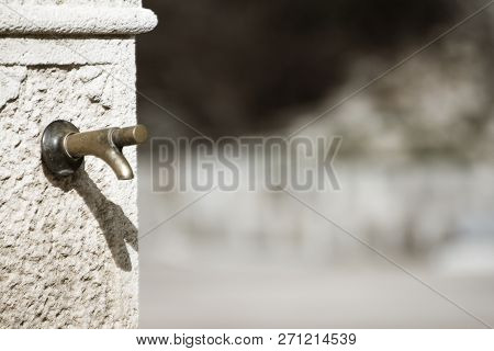 Solitary Fountain In Rural Environment Without Water
