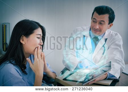 Teams Of Doctors Examining With 3d Vistual Face About Facial Lift Surgery Program To The Patient  At