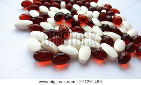 Assorted Colorful Pharmaceutical Medicine Pills, Tablets And Capsules On White Background. Pharmacy 