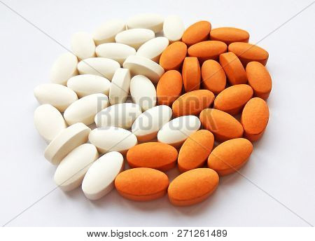 Assorted Colorful Pharmaceutical Medicine Pills, Tablets And Capsules On White Background. Pharmacy 