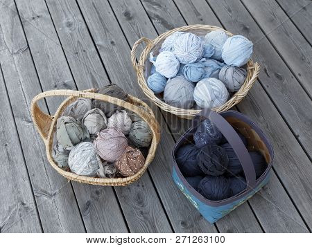 Three Baskets Full Of Balls Of Matte Crumble In Many Colors