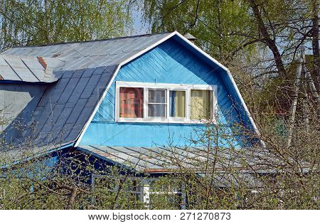 Country House In The Garden On A Suburban Summer Cottage
