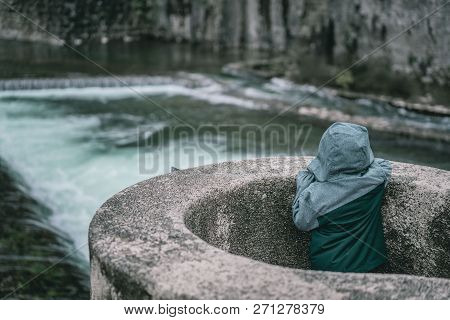 Little Boy In Waterproof Jacket Looking At The Massive Walls Of The Fortification Bastion Riva By Th