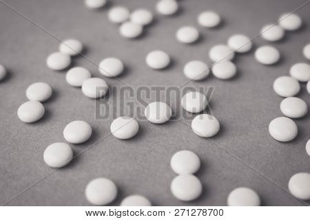 Little Beautiful Medical Pharmaceptic Round Pills, Vitamins, Drugs, Antibiotics On A Black And White
