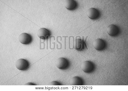 Little Beautiful Medical Pharmaceptic Round Pills, Vitamins, Drugs, Antibiotics On A Black And White