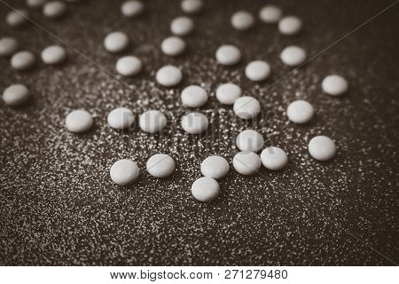 Little Beautiful Medical Pharmaceptic Round Pills, Vitamins, Drugs, Antibiotics On A Black And White