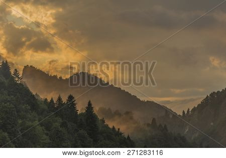 Orange Sunset With Fog After Storm In Lesnica Village In Pieniny National Park