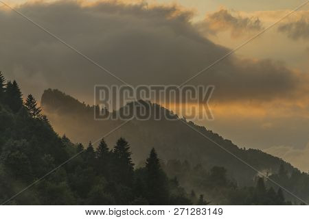 Orange Sunset With Fog After Storm In Lesnica Village In Pieniny National Park