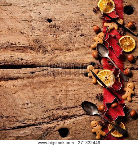 Christmas Wooden Background With Christmas Nuts Sortiment.