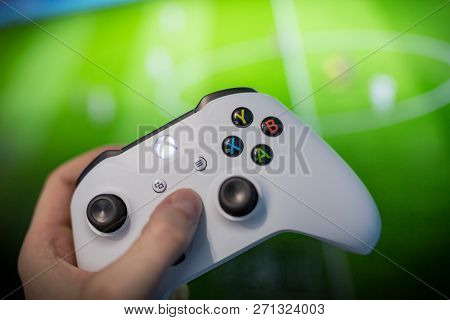Debrecen, Hungary, Marc 11. 2018 View From The Top On Xbox One S Gamepad, Game Console, Kid Holding 
