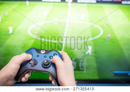 Debrecen, Hungary, Marc 11. 2018 View From The Top On Xbox One S Gamepad, Game Console, Kid Holding 