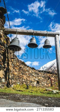 Bells In Lamaria Church In Zhibiani - Ushguli Community Of Villages, Upper Svaneti, Georgia. Snow Co