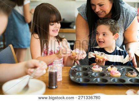 Family with fresh homemade cucakes