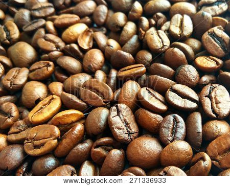 Roasted Brown Coffee Beans Texture Background. Сlose Up Pattern Photography