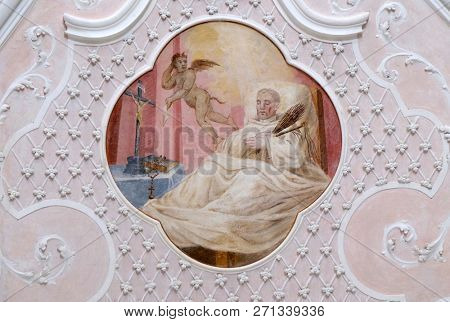 BRONNBACH, GERMANY - JULY 07, 2018: Ceiling frescoes with scenes from the life of St. Bernard of Clairvaux by Johann Adam Remele in Bernard Hall, Cistercian Abbey of Bronbach in Reicholzheim, Germany