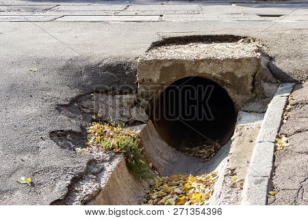 Large-diameter Iron Pipe Under The Roadway To Discharge Rainwater Flows In The City Of Dnipro, Ukrai