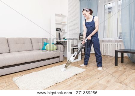 Cleaning Service With Professional Equipment During Work. Professiona Carpet Dry Cleaning, Sofa Dry 