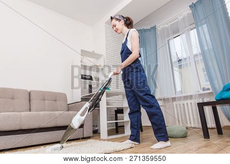 Cleaning Service With Professional Equipment During Work. Professiona Carpet Dry Cleaning, Sofa Dry 