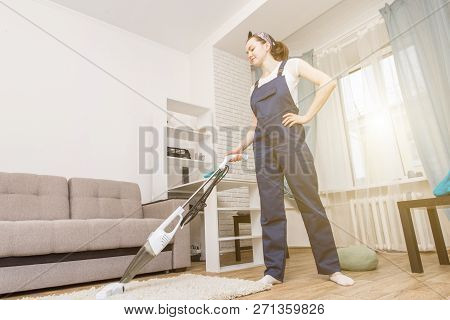 Cleaning Service With Professional Equipment During Work. Professiona Carpet Dry Cleaning, Sofa Dry 