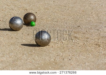 Petanque Balls On The Game Track While The Match Is Played