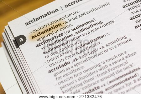 The Word Or Phrase Acclamation In A Dictionary Highlighted With Marker.