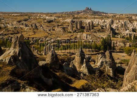 Cappadocia, Turkey: Beautiful Landscape On The Panorama Of Mountains And Rocks. The Fortress Of Uchi