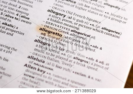 The Word Or Phrase Allegretto In A Dictionary Highlighted With Marker.