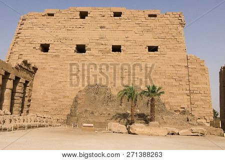 Buildings And Columns Of Ancient Egyptian Megaliths. Ancient Ruins Of Egyptian Buildings