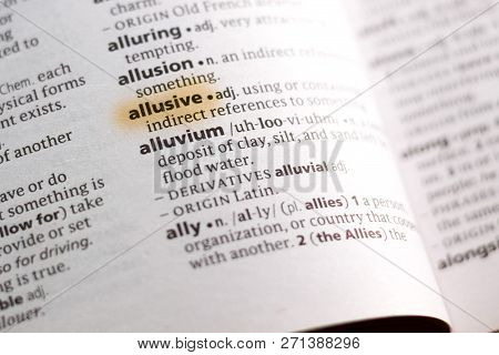 The Word Or Phrase Allusive In A Dictionary Highlighted With Marker.