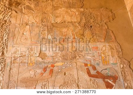 Egyptian Hieroglyphs And Drawings On The Walls And Columns. Egyptian Language, The Life Of Ancient G