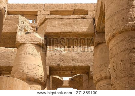 Egyptian Hieroglyphs And Drawings On The Walls And Columns. Egyptian Language, The Life Of Ancient G