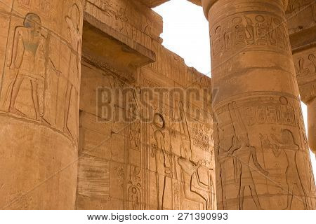Egyptian Hieroglyphs And Drawings On The Walls And Columns. Egyptian Language, The Life Of Ancient G
