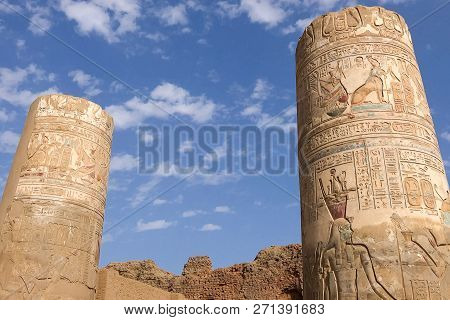 Egyptian Hieroglyphs And Drawings On The Walls And Columns. Egyptian Language, The Life Of Ancient G