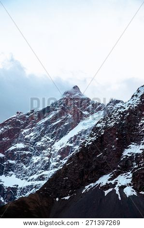 Very High Mountains In Central Asia, Tajikistan, During Drekking And Climbing