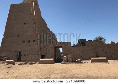 Buildings And Columns Of Ancient Egyptian Megaliths. Ancient Ruins Of Egyptian Buildings