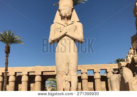Buildings And Columns Of Ancient Egyptian Megaliths. Ancient Ruins Of Egyptian Buildings