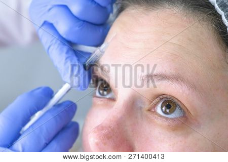Contour Plastic Face. Rejuvenating Facial Injections Procedure For Tightening And Smoothing Wrinkles