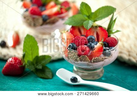 Summer Dessert With Strawberries On A Wooden Background.