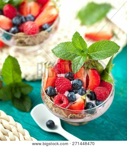 Summer Dessert With Strawberries On A Wooden Background.