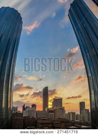 Portrait Fisheye Lens Shot Of World Trade Center, (sheikh Mohammed Bin Rashid Tower) Against A Cloud