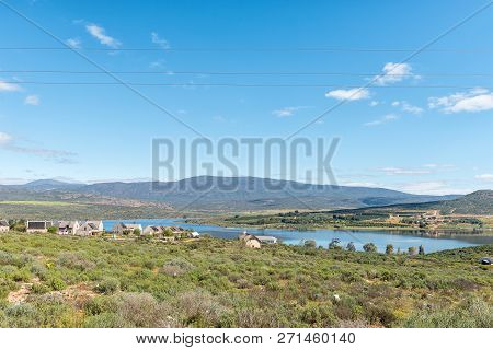 Clanwilliam, South Africa, August 22, 2018: A Landscape With Houses Overlooking The Clanwilliam Dam 