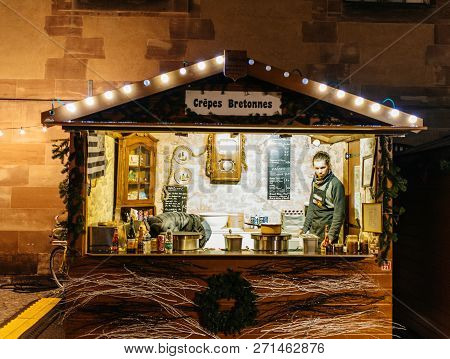 Strasbourg, France - Nov 29, 2017: Christmas Chalet Stall Selling Traditional Crepes Bretonnes Panca