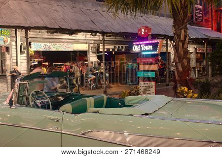 Orlando, Florida.  November 02, 2018 . Partial View Of Vintage Car And  Old Town Sign In Kissimmee A
