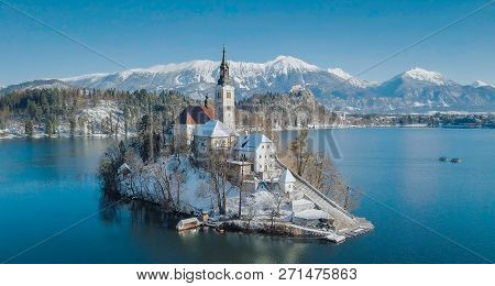 Panoramic View Of Famous Bled Island (blejski Otok) At Scenic Lake Bled With Bled Castle (blejski Gr