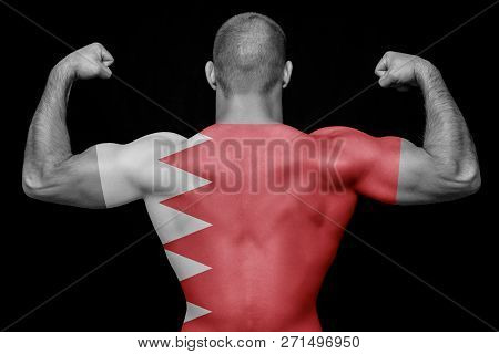 The Back Of A Young Sports Man Wearing A T-shirt With The National Flag Of Bahrain On A Black Isolat