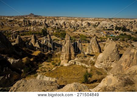 Cappadocia, Turkey: Beautiful Landscape On The Panorama Of Mountains And Rocks. The Fortress Of Uchi
