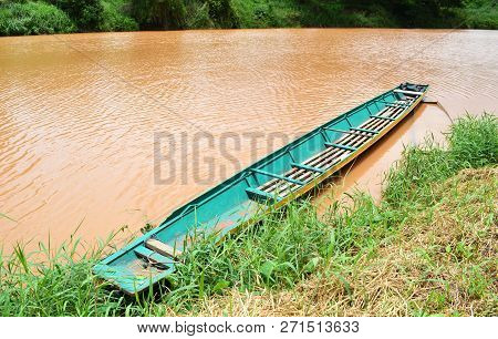 Old Wooden Boat On Riverside Nature Fishing Boat On Water Turbid River
