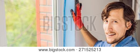Man In A Blue Shirt Does Window Installation Banner, Long Format